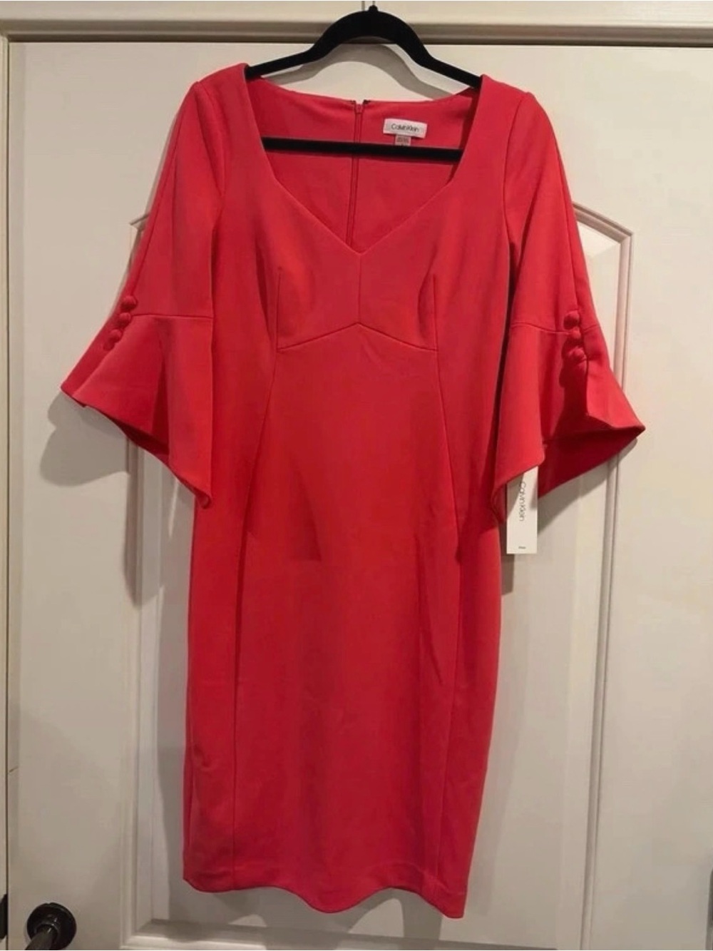 Calvin Klein Coral Dress with V-Neck and Bell Sleeves
